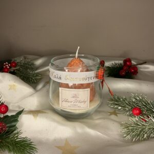 Χειροποίητο χριστουγεννιάτικο κερί σε γυάλινο βαζάκι με ανάγλυφη επιφάνεια και κορδέλα «Καλά Χριστούγεννα».